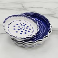 Ceramic Dish Set with Blue White Polka Dot and Ruffled Edge Stacked on Marble Surface 3d model