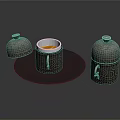 Decorative Coffee Cup With Patterns On Blue Plate And Lidded Containers In Black Background