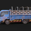 Blue Rusty Vintage Truck Featuring Open Cargo Bed And Metal Side Rails