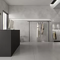 Modern Clothing Store Interior With Mannequins Displaying Dresses Clothes on Hangers and Display Table