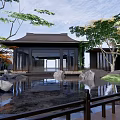 Rockery Stones In Traditional Garden With Lush Green Plants And Pond