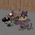 Colorful Flower Arrangements in Vases on Display Against Wooden Wall Background