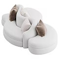Modern Abstract Shaped Sofa With White And Gray Upholstery And Colorful Pillows