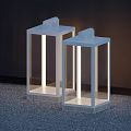 Modern White Square Outdoor Lamps With Transparent Panels Illuminated On Ground