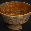 Ancient Cracked Ceramic Bowl With Decorative Patterns And Pedestal Base In Rustic Brown Tone