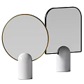 Modern Mirrors With Round Gold Frame And Distinct Shaped Black Frame On White Marble Base