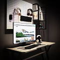 Modern Computer Setup With Monitor Keyboard Headphones And Desk Accessories