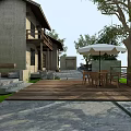 Traditional Guesthouse Building With Wooden Walkway Stone Pavement And Outdoor Seating