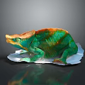 Vibrant Green And Orange Chameleon With Crested Head On White Base Against Dark Background