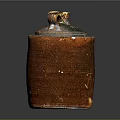 Handcrafted Brown Textured Pottery Sculpture With Top Handle And Artisanal Details