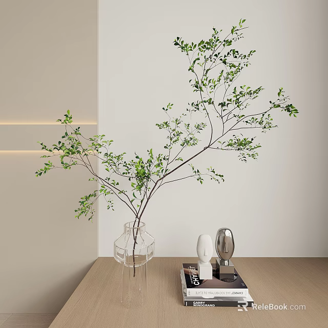 Green Branches In Transparent Glass Vase With Decorative Items On Interior Tabletop 3d model