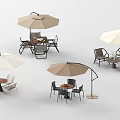 Multiple Outdoor Table Sets Featuring Umbrella And Matching Chairs For Patio Use
