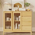 Cozy Living Room With Rattan Chair Plants And Wooden Cabinet