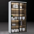 Modern Display Cabinet Interior With Bread Bowls Mugs Glassware And Small Plant