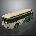Vintage London Bus Model With Cream And Green Exterior And Reflective Surface Design