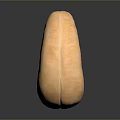 Whole Natural Cashew Nut with Smooth Surface Brown Color on Dark Background
