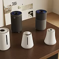 Black And White Small Smart Devices On Wooden Table With Modern Design
