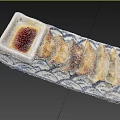 Pan Fried Dumplings With Soy Sauce On Blue And White Patterned Plate 3d model