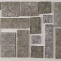 Decorative Background Wall Design With Various Shaped Stone Tiles And Natural Textures