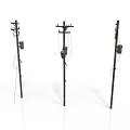 Three Utility Poles With Hanging Wires And Attached Equipment