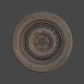 Worn Car Tire With Deep Tread And Rusty Metal Rim On Gray Background