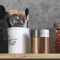 Stylish Kitchen Utensils Bowls Plates Storage Jars and Metal Canisters on Wooden Shelves