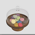Assorted Colorful Macarons Displayed Under Glass Dome On Wooden Tray