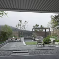 Tranquil Courtyard Garden With Wooden Pergola Outdoor Seating Lush Greenery And Mountain View