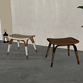 Woven Seat Wooden Stools With Light And Dark Colored Legs In Modern Indoor Space