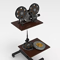 Vintage Projection Monitoring Equipment With Film Reels On Wooden Stand And Table