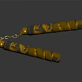 Ornate Gold And Black Nunchucks With Decorative Patterns And Connecting Chain