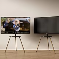 Two Modern TVs on Tripod Stands with Animated Display and Black Screen 3d model