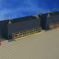 Large Black Industrial Equipment With Yellow Overhead Structures And Guardrail Platforms