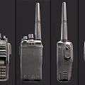 Vintage Walkie Talkies With Antennas Display Screens And Control Buttons On Dark Surface