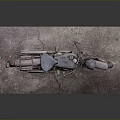 Old Vintage Motorcycle Displayed on Gray Platform with Headlight and Seat