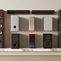 Different Style Speaker Systems Arranged On Shelf With Modern Design Features