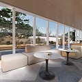 Modern Casual Area With Large Windows Green Trees Beige Sofas And Round Coffee Tables