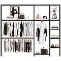 Fashionable Clothes Display With Racks Hanging Black White Gray Garments And Bags Shoes