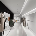 Modern Bright Clothing Store Interior With Mannequins Hanging Clothes And Large Screen