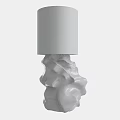 Modern White Table Lamp With Irregular Textured Base And Cylindrical Shade