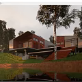 Modern Detached Villa On Hillside With Large Windows Green Surroundings And Water View