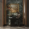Luxurious Console Table with Green Marble Wall Gold Framed Painting Black Countertop Sculpture and Books