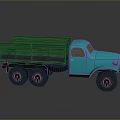 Vintage Blue Truck With Green Cargo Bed And Smooth Ground Reflection