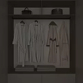 White Robes Hanging In Modern Wardrobe With Folded Towels And Leather Bags