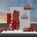 Creative White Cube Art Installation With Red Floral Decor And Sunset Sky Backdrop