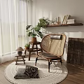 Wicker Leisure Chair with Black Cushion and Plants by Window Books on Shelf and Rug