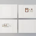 White Wall With Different Decorative Designs Featuring Frames And Small Decor Items 3d model
