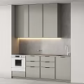 Sleek Black Kitchen Interior With Cabinets Countertop Built in Oven And Under Cabinet Lighting