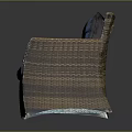 Modern Woven Rattan Chair Featuring Blue Cushion And Brown Comfortable Seat