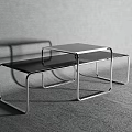 Modern Coffee Table With Metal Frame And Black Glass Top In Contemporary Design